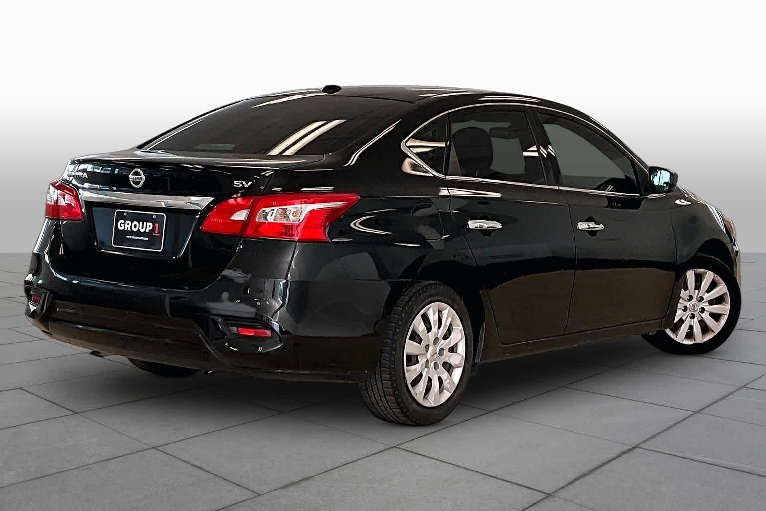 Used 2017 Super Black Nissan SV image 12
