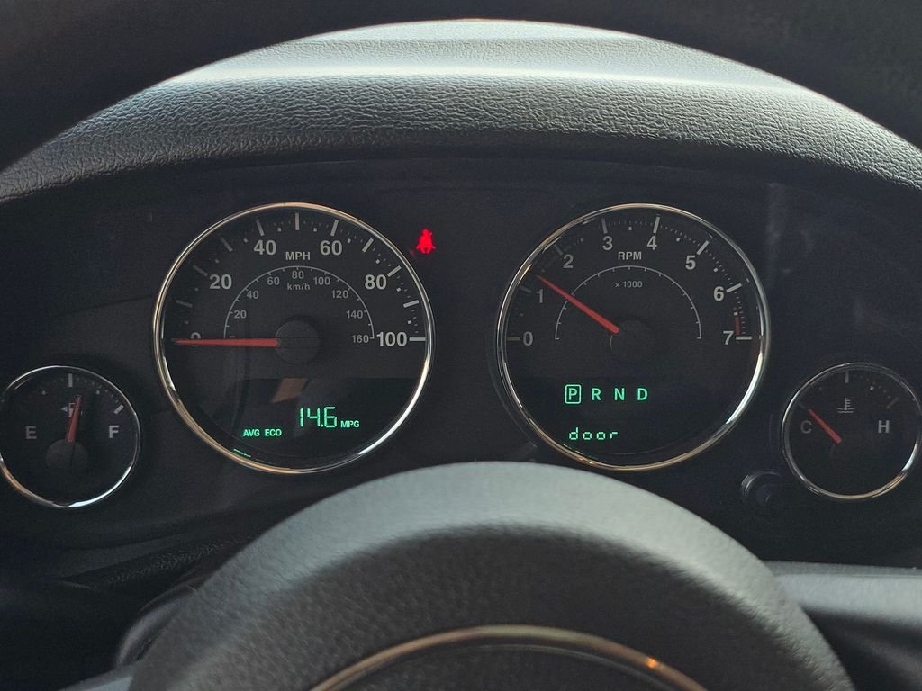 Used 2013 Black Jeep Unlimited Sport image 23