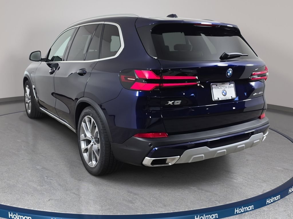 New 2026 Tanzanite Blue II Metallic BMW xDrive50e image 7