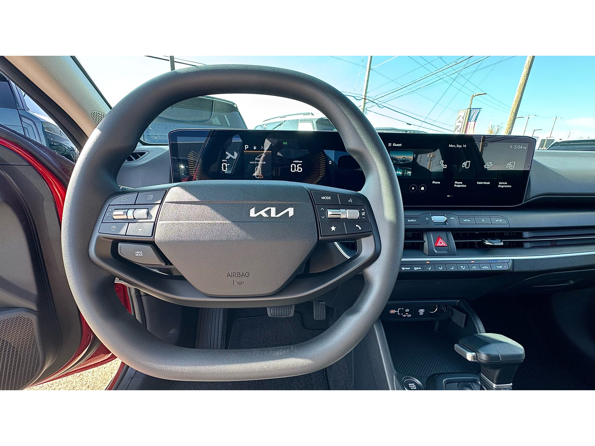 New 2026 Currant Red Kia LXS image 10
