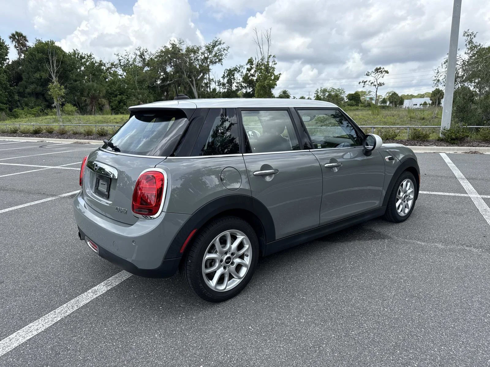 Used 2019 MINI Hardtop 4 Door Base with VIN WMWXU1C57K2J03243 for sale in New Smyrna Beach, FL