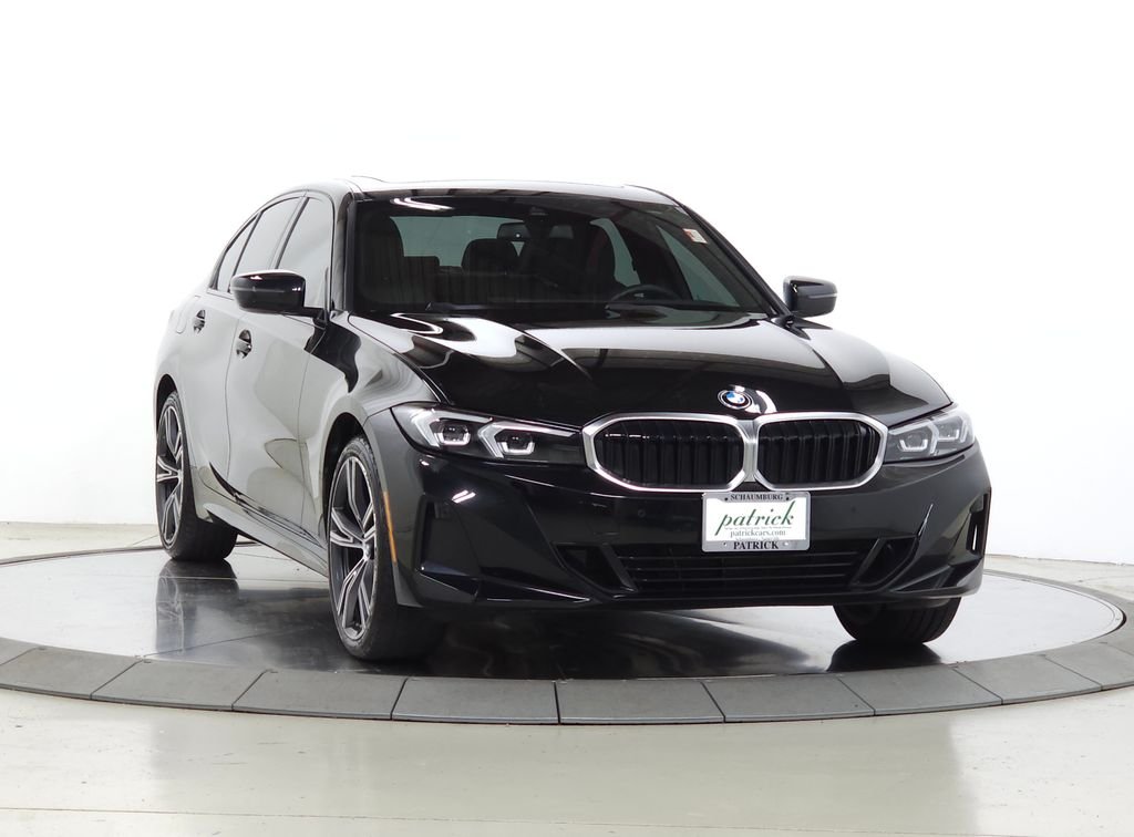 Used 2023 Black Sapphire Metallic BMW 330i xDrive image 1