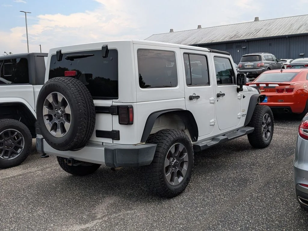 Used 2012 White Jeep Unlimited Sahara image 4