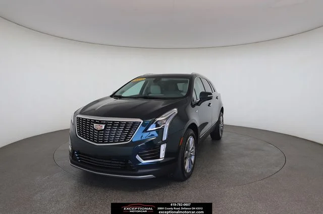 Used 2025 Green Cadillac Premium Luxury image 1