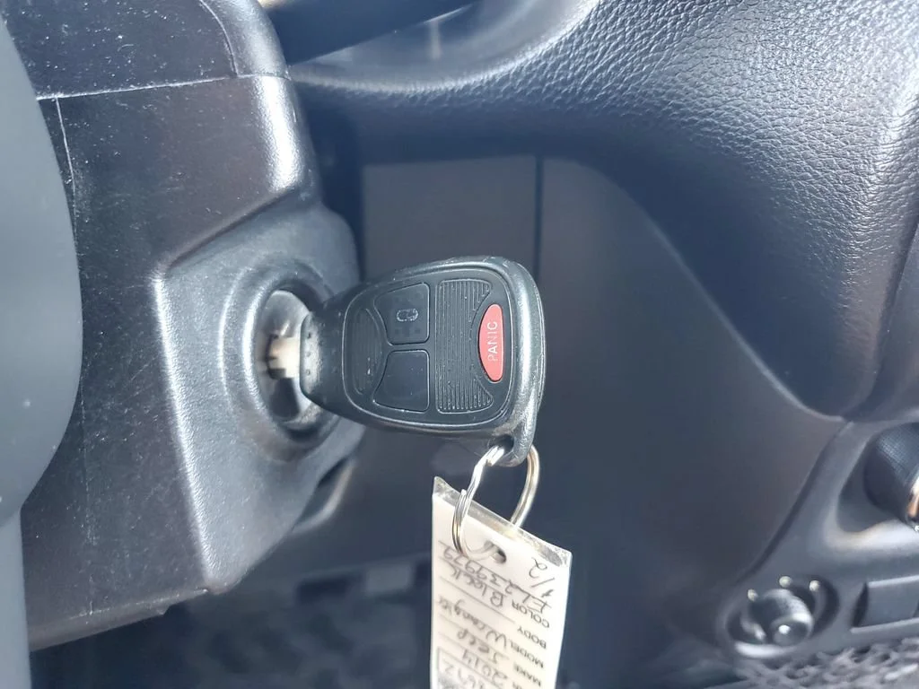 Used 2014 Black Jeep Sahara image 24