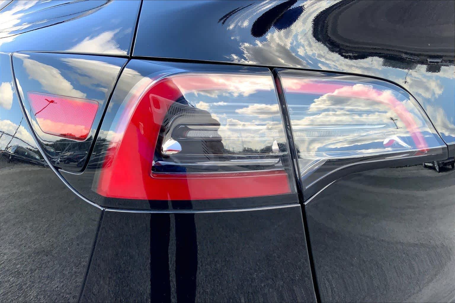 Used 2024 Solid Black Tesla  image 26