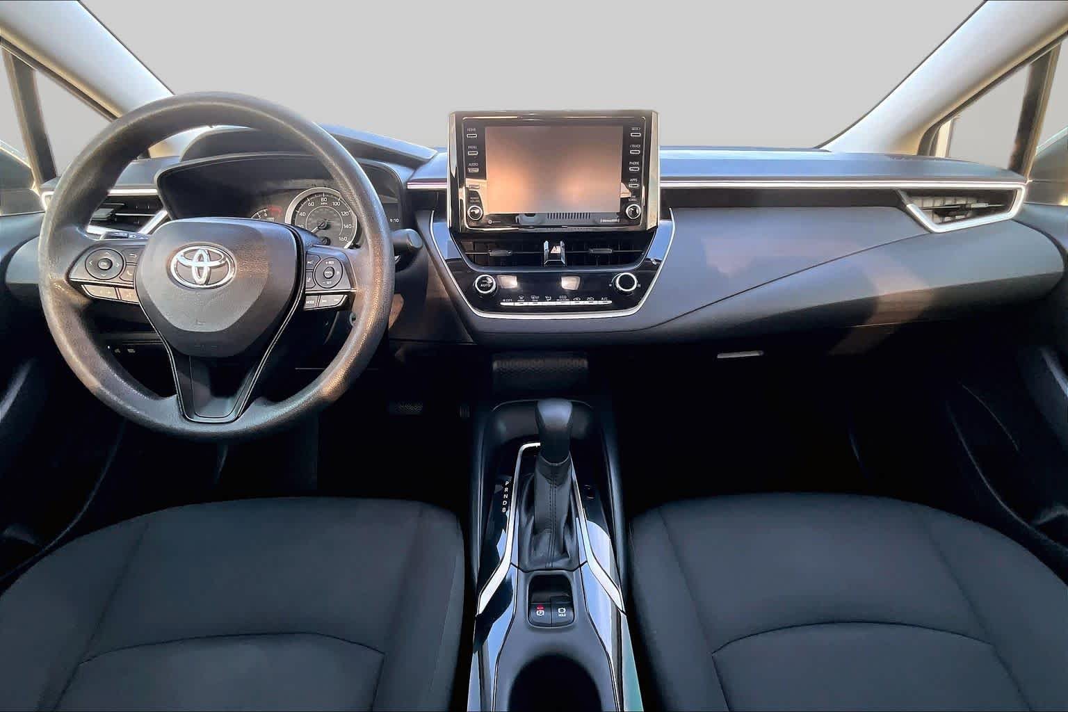 Used 2021 Super White Toyota LE image 16