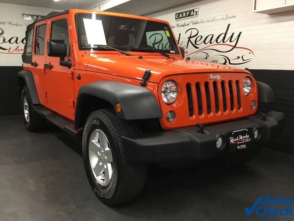 Used 2015 Orange Jeep Unlimited Sport image 3