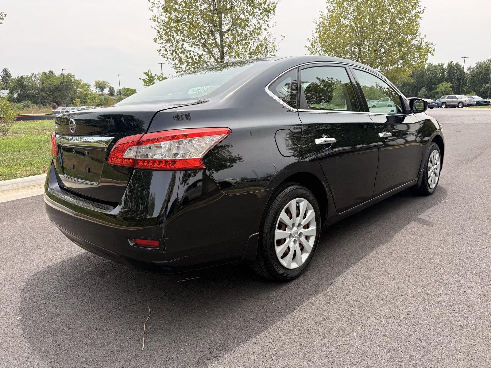Used 2015 Super Black Nissan S image 5