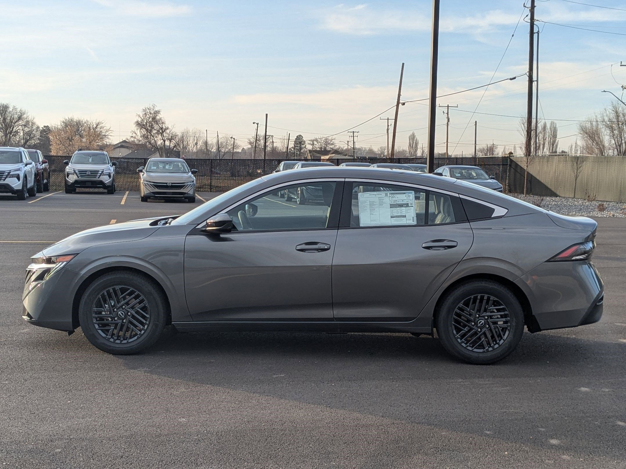 New 2026 Gun Metallic Nissan SV image 7