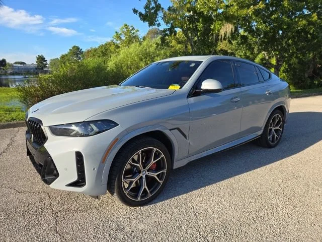 Used 2025 Brooklyn Grey Metallic BMW xDrive40i image 1
