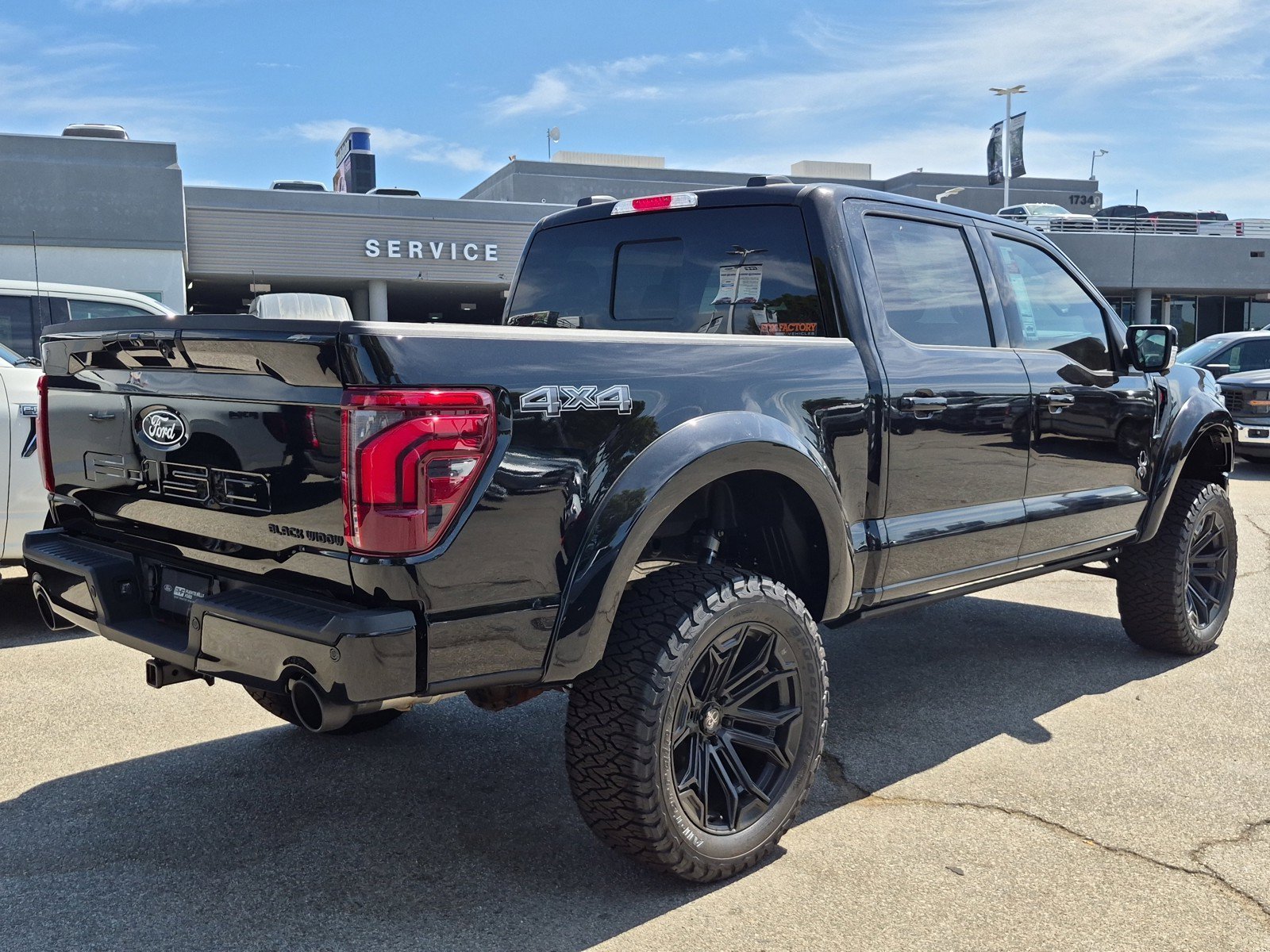 New 2026 Agate Black Metallic Ford Lariat® image 8