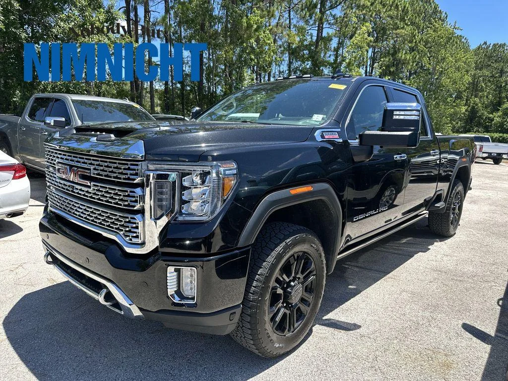 Used 2021 Ebony Twilight Metallic GMC Denali image 1