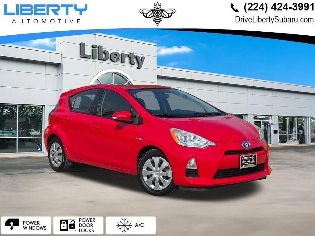 Used 2013 Red Toyota Three image 1