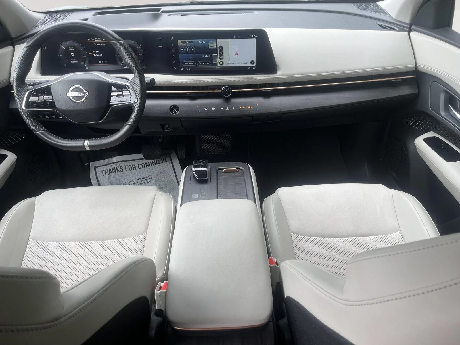 Used 2025 Everest White Pearl Tricoat/Black Diamond Pearl Nissan EVOLVE+ image 16