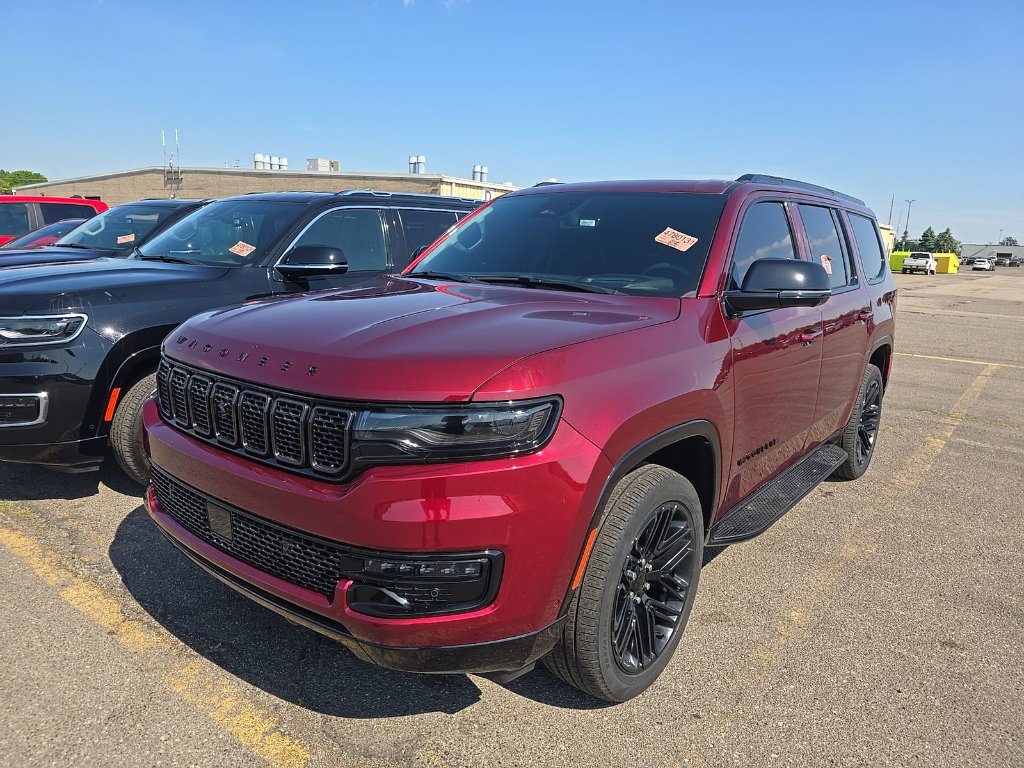 Used 2024 Velvet Red Pearlcoat Jeep Series II Carbide image 1