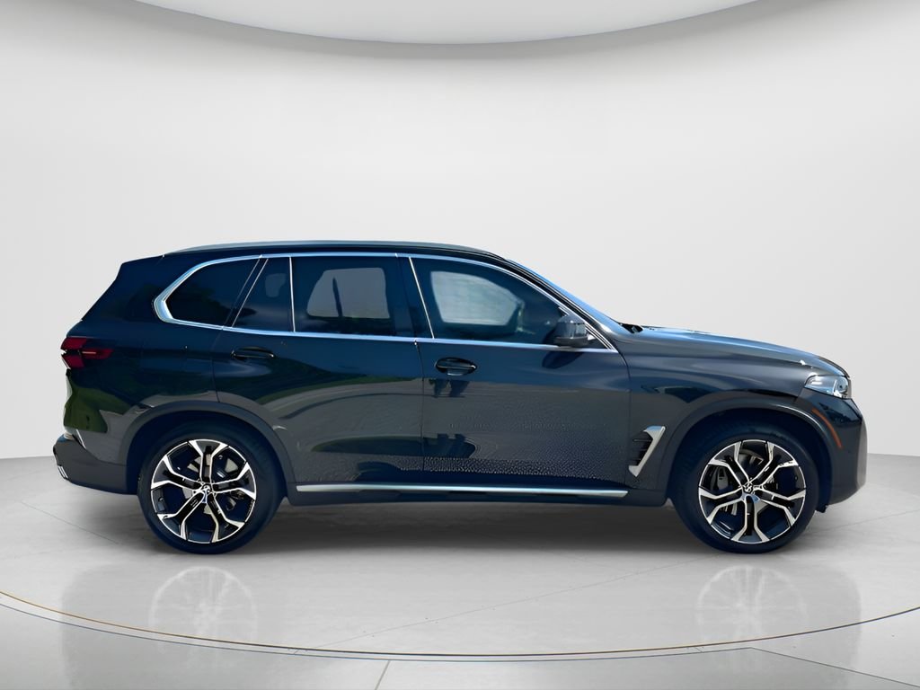 Certified Used 2025 Black Sapphire Metallic BMW xDrive40i image 4