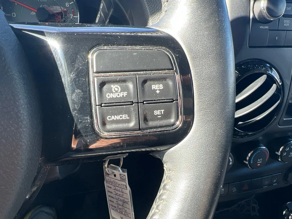 Certified Used 2016 Purple Jeep Unlimited Sahara image 33