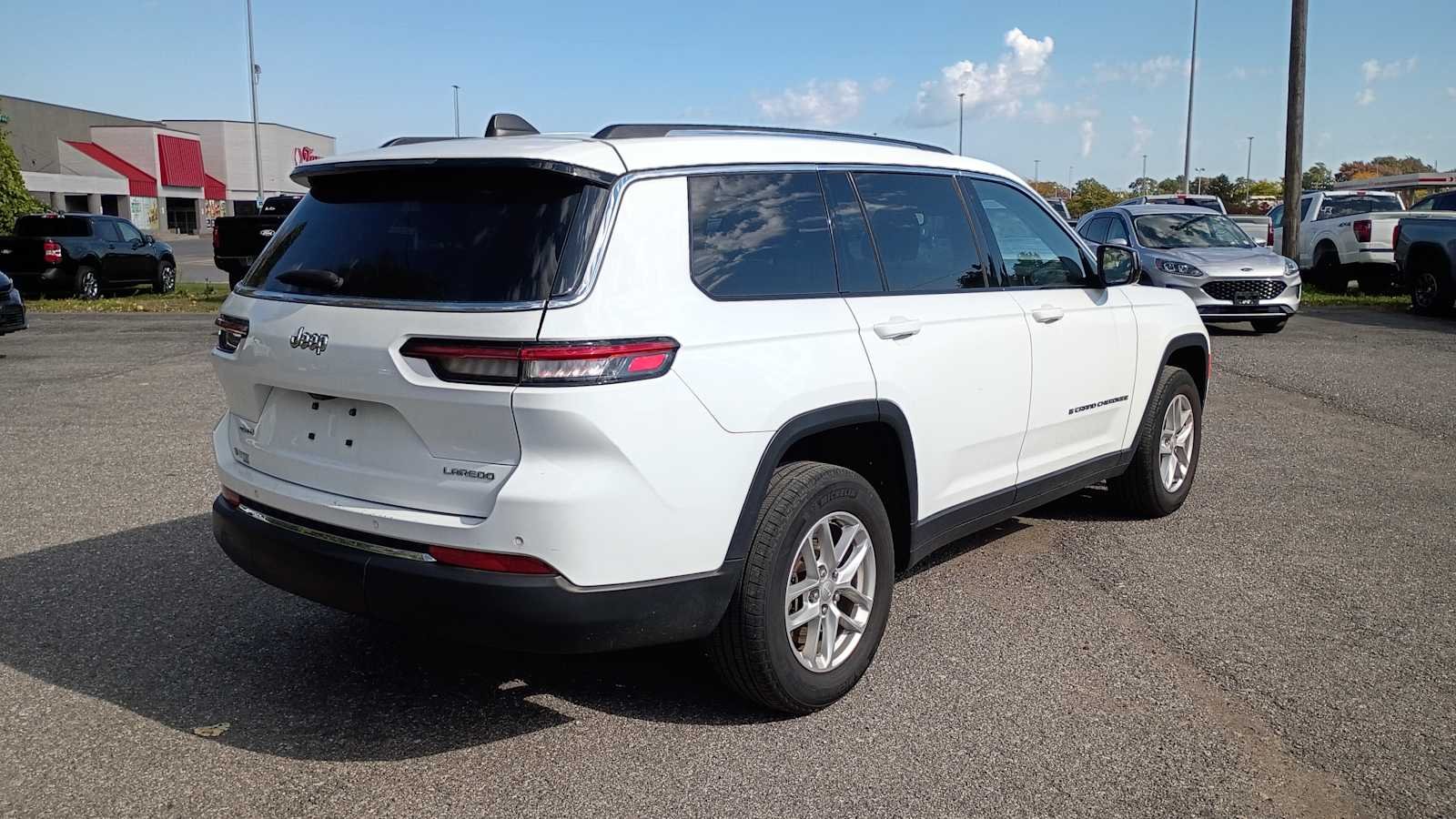 Used 2023 Bright White Clearcoat Jeep Laredo image 3