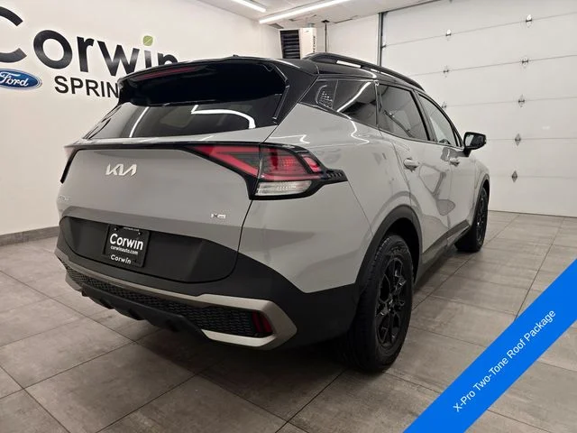 Used 2023 Ebony Black Kia X-Pro image 5