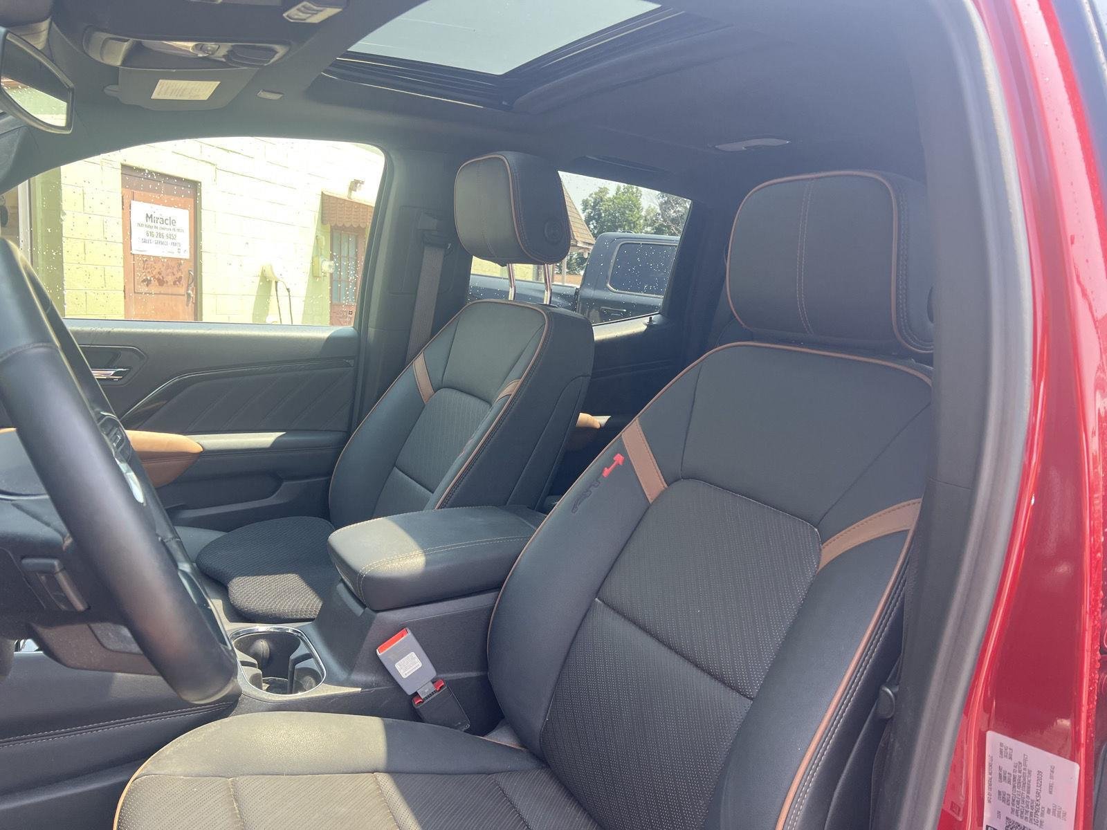 Used 2024 Volcanic Red Tintcoat GMC 4WD AT4 image 13