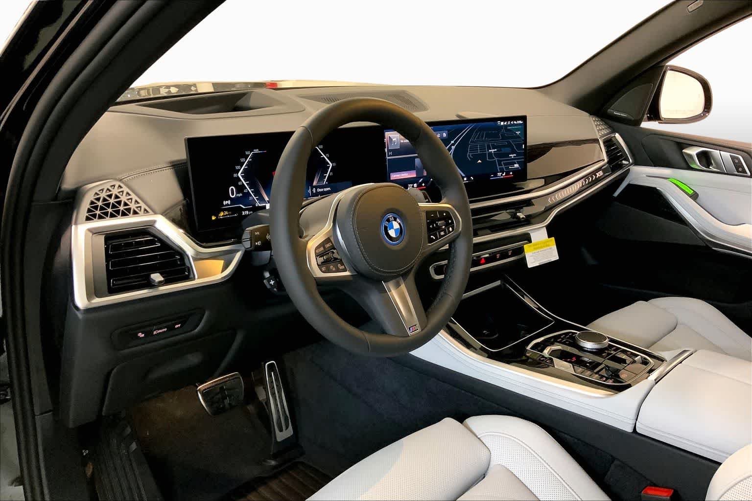 New 2026 Black Sapphire Metallic BMW xDrive50e image 8