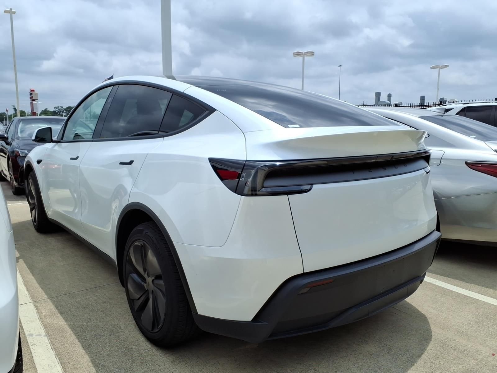 Used 2026 Tesla Model Y Premium with VIN 7SAYGDED2TF427996 for sale in Conroe, TX