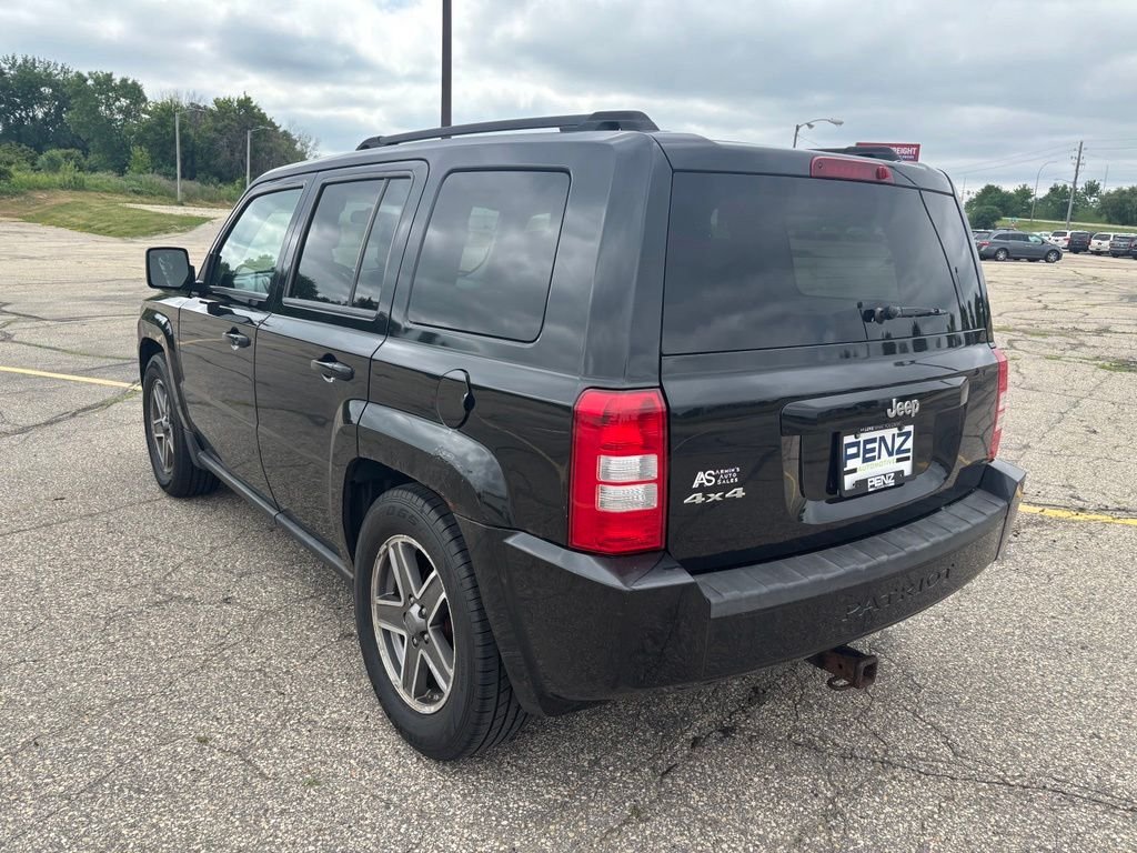 Used 2010 Black Jeep Sport image 5