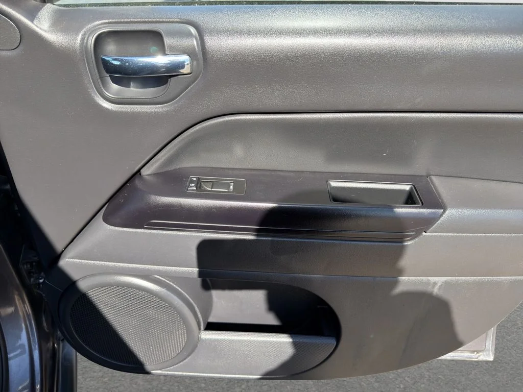Used 2016 Gray Jeep Sport image 27