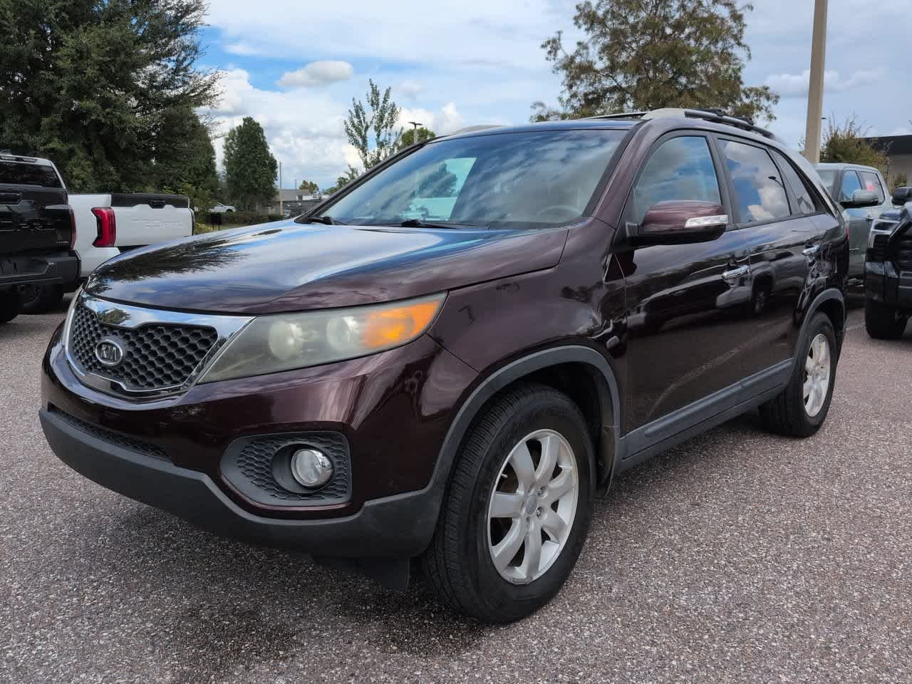 Used 2012 Kia Sorento LX with VIN 5XYKT4A66CG229937 for sale in Wesley Chapel, FL