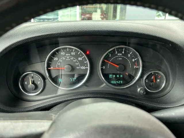 Used 2014 Red Jeep Unlimited Sahara image 22