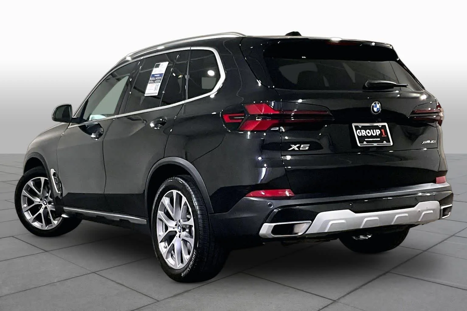 Certified Used 2024 Black Sapphire Metallic BMW xDrive40i image 11