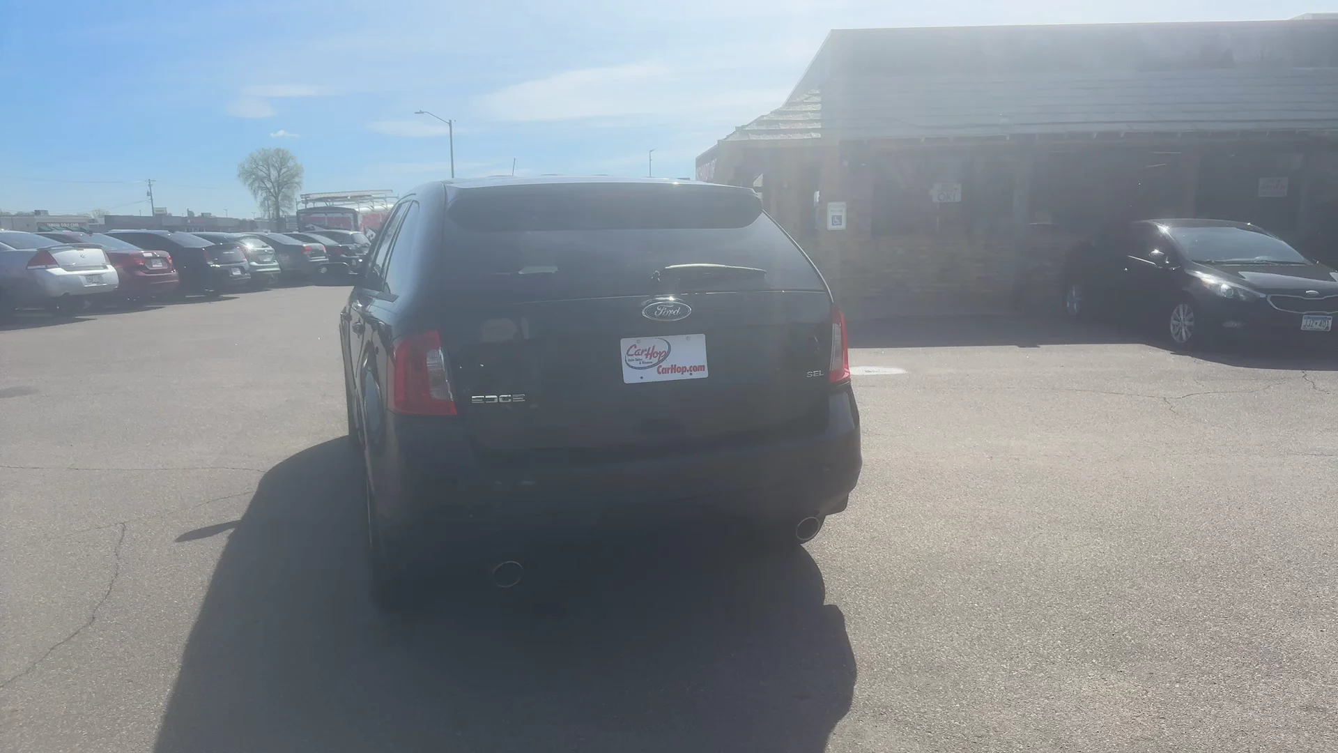 Used 2013 Black Ford SEL FWD image 6