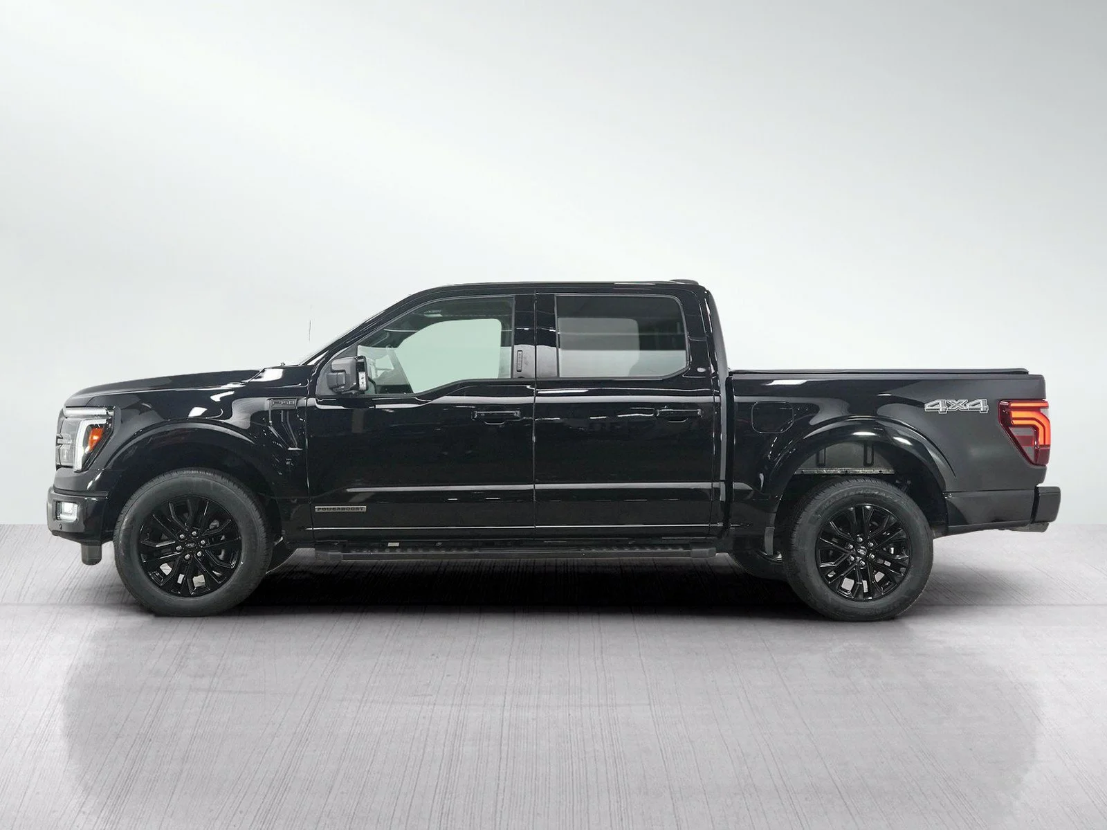 Used 2024 Agate Black Metallic Ford LARIAT image 2