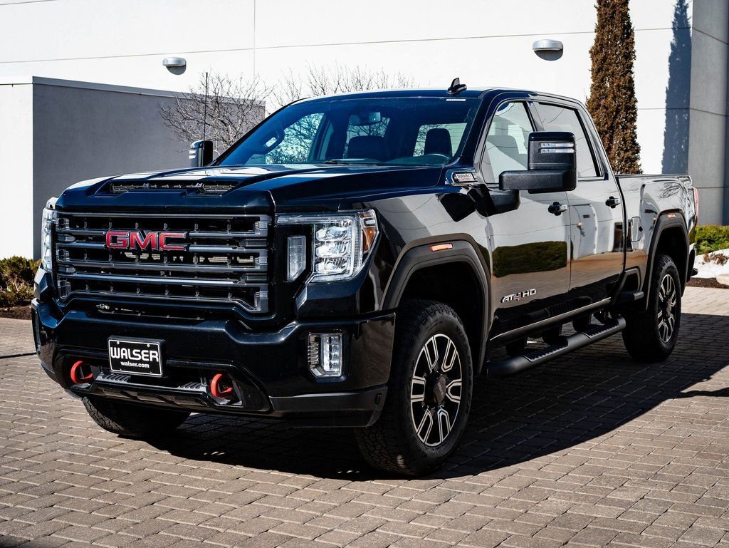 Used 2023 Ebony Twilight Metallic GMC AT4 image 1