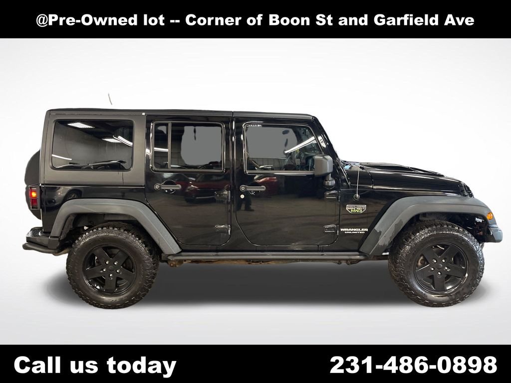 Used 2012 Black Jeep Unlimited Rubicon image 6