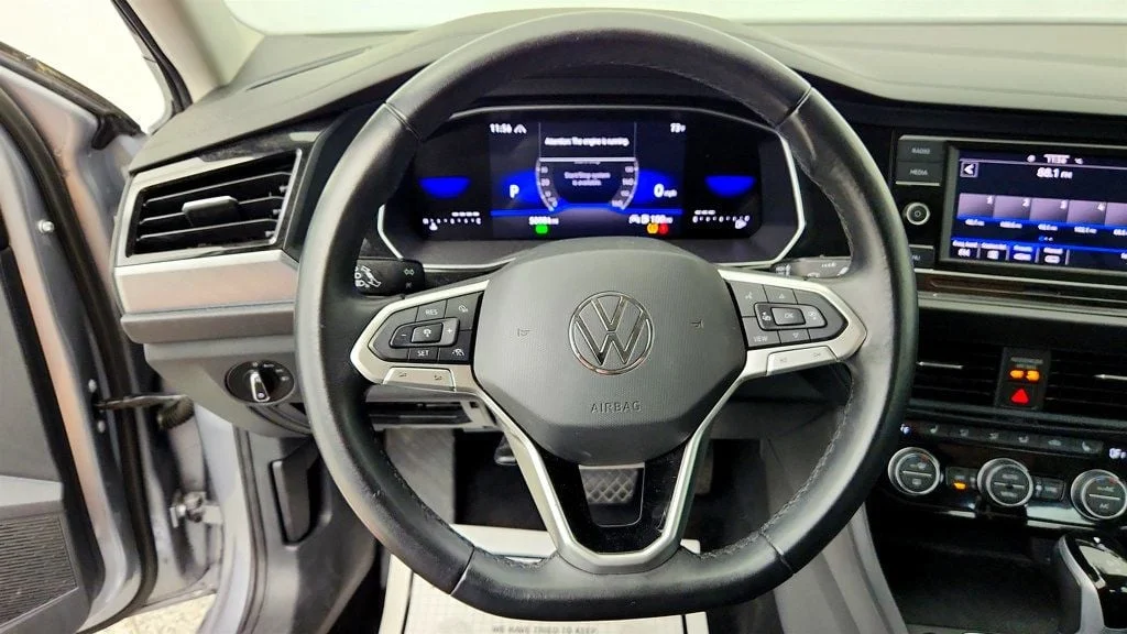 Used 2024 Pyrite Silver Metallic Volkswagen SE Automatic image 11