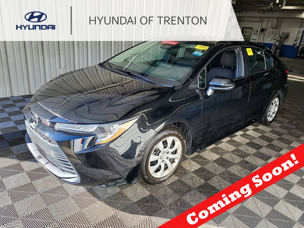Used 2023 Black Toyota LE image 1