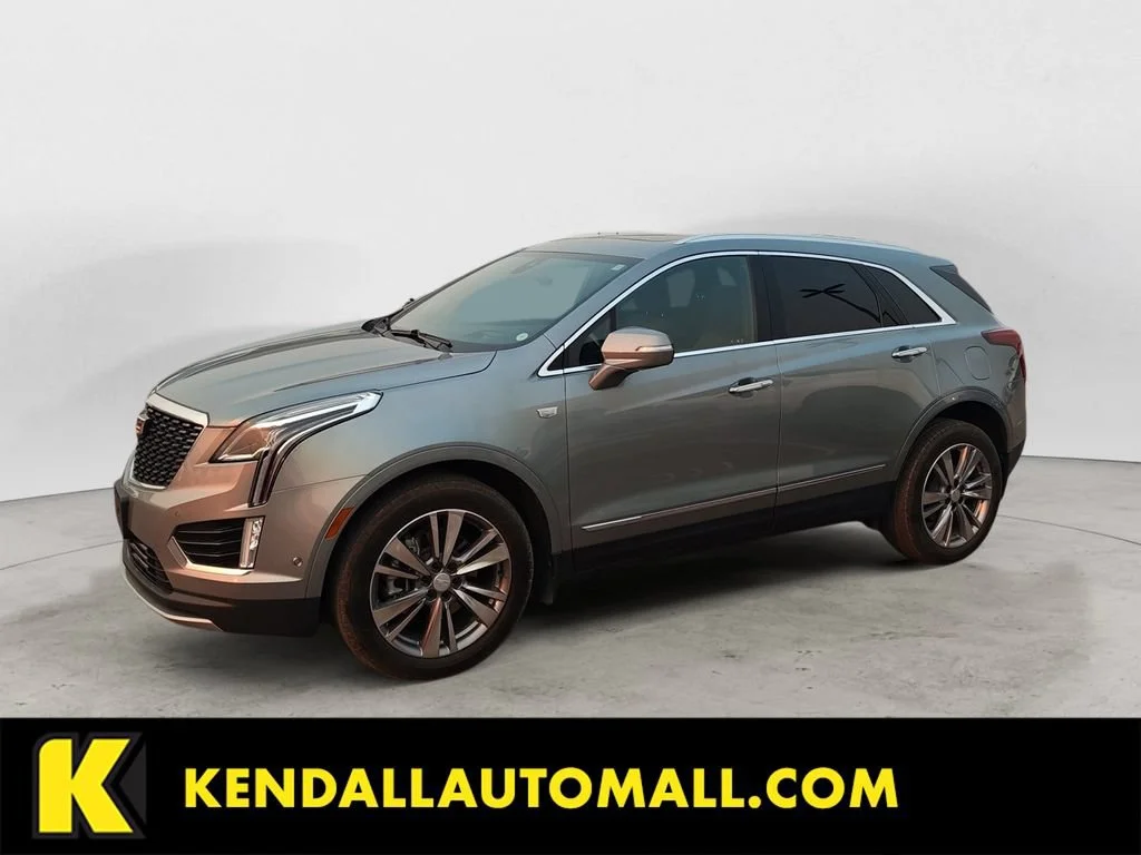 Used 2023 Argent Silver Metallic Cadillac Premium Luxury image 1