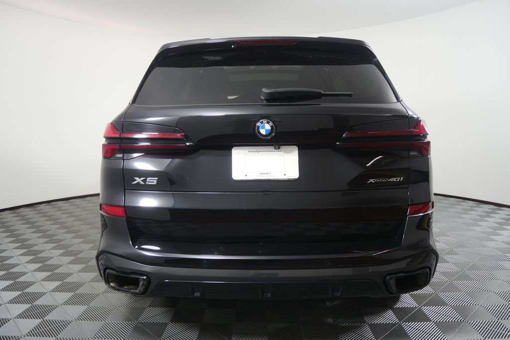 Certified Used 2024 Black Sapphire Metallic BMW xDrive40i image 4