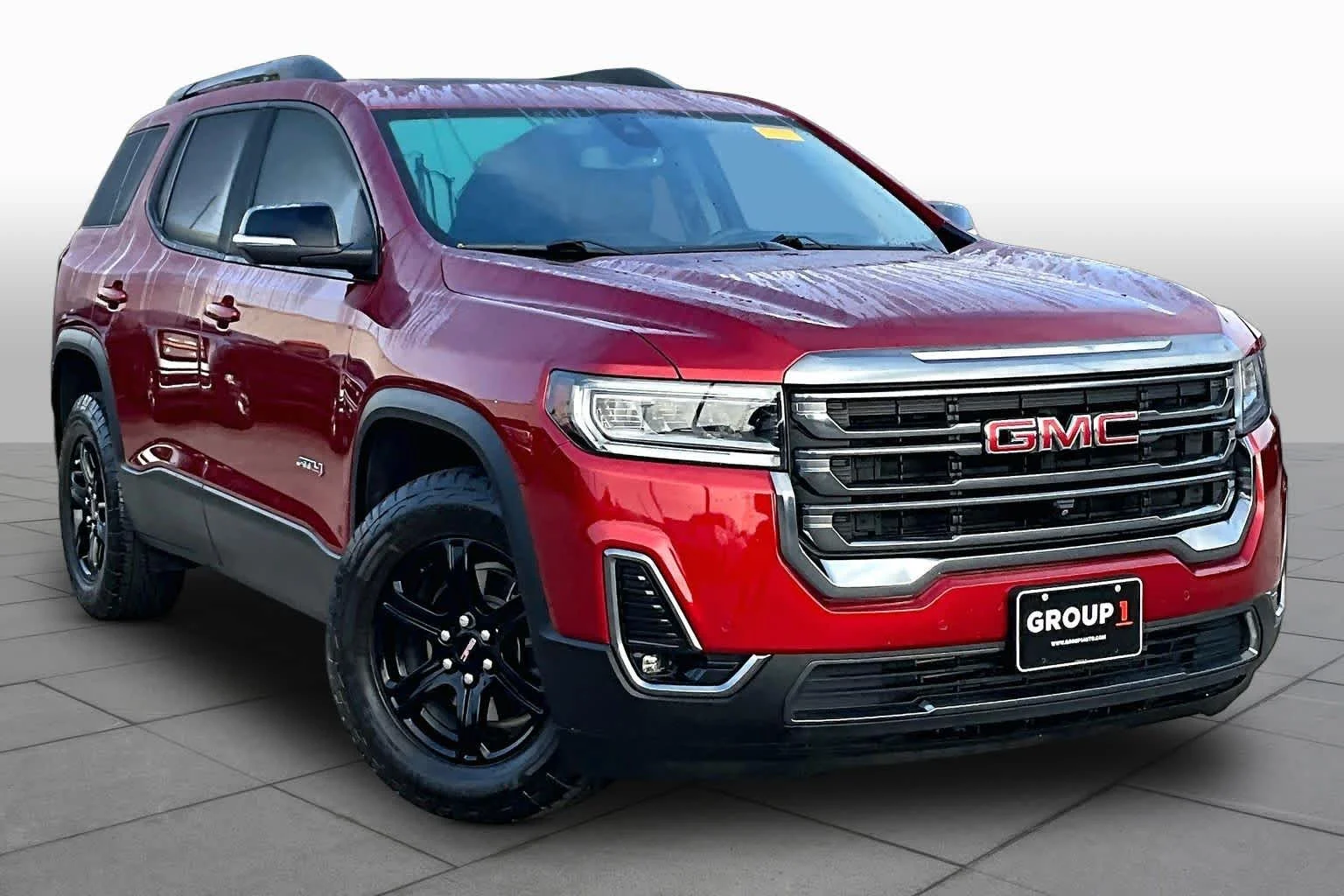 Used 2023 VOLCANIC RED TINCOAT GMC AT4 image 4