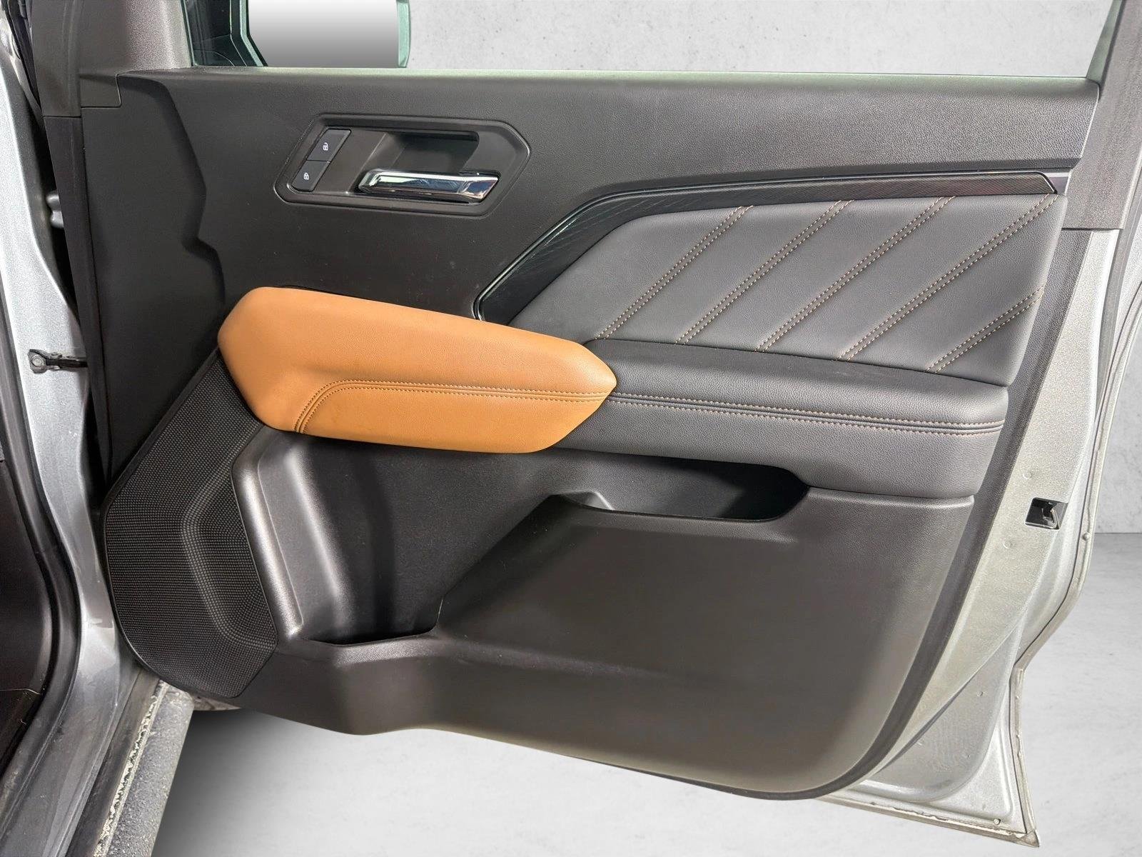 Used 2024 Sterling Metallic GMC 4WD AT4 image 14