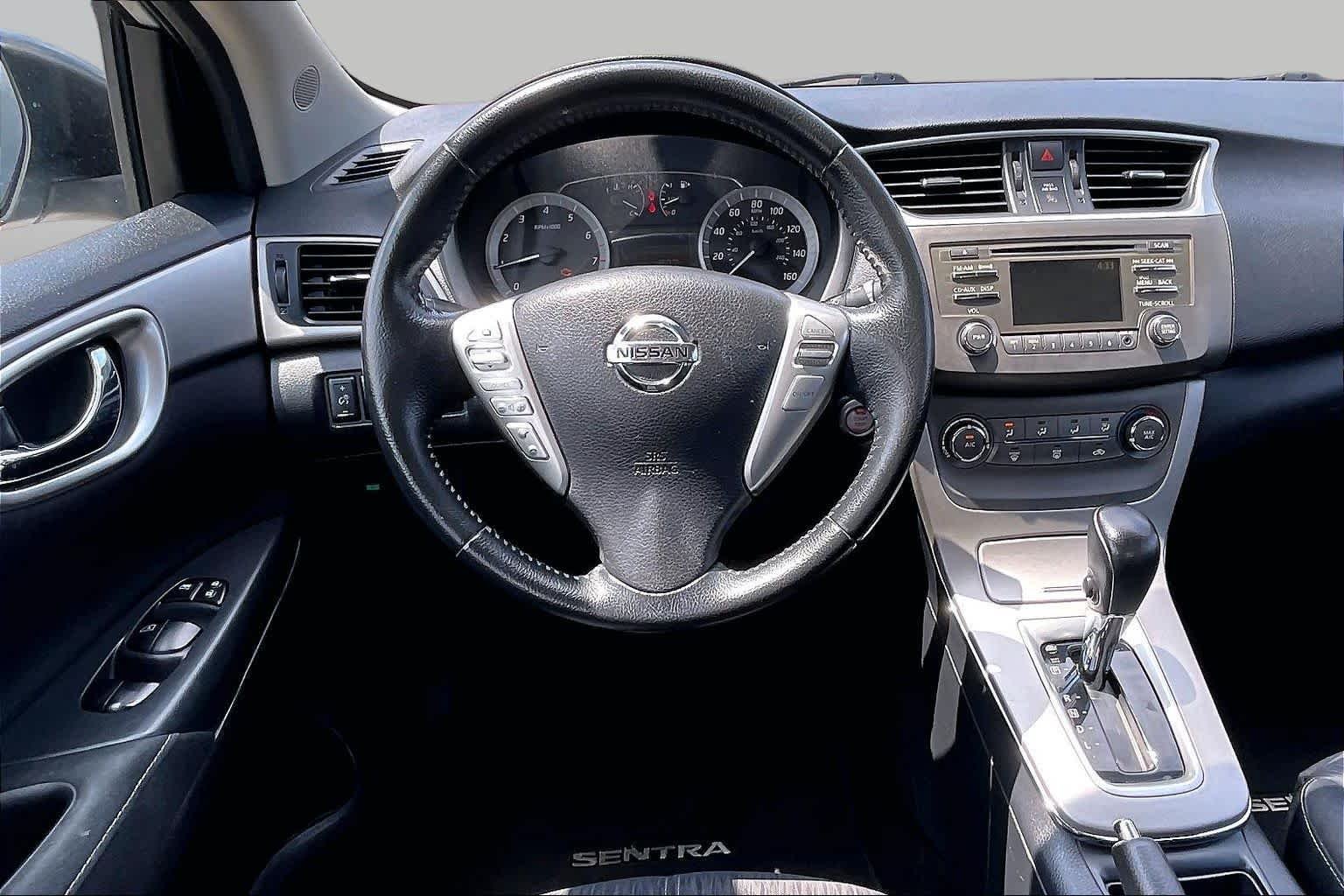 Used 2014 Brilliant Silver Nissan SV image 6