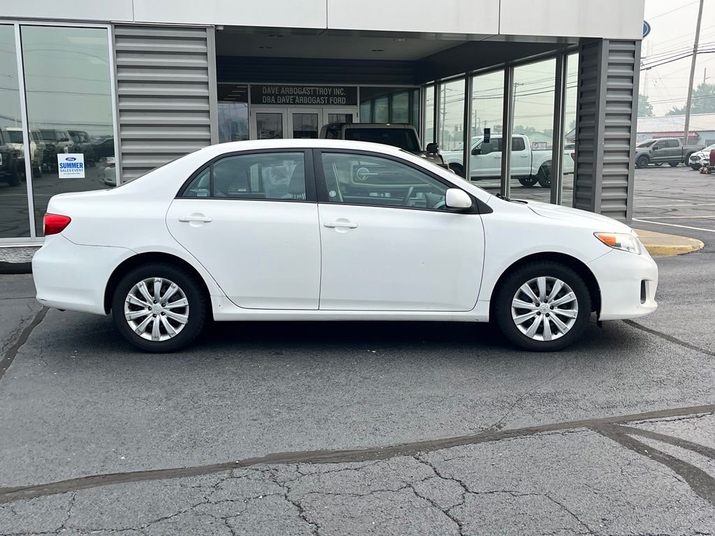 Used 2012 White Toyota LE image 2