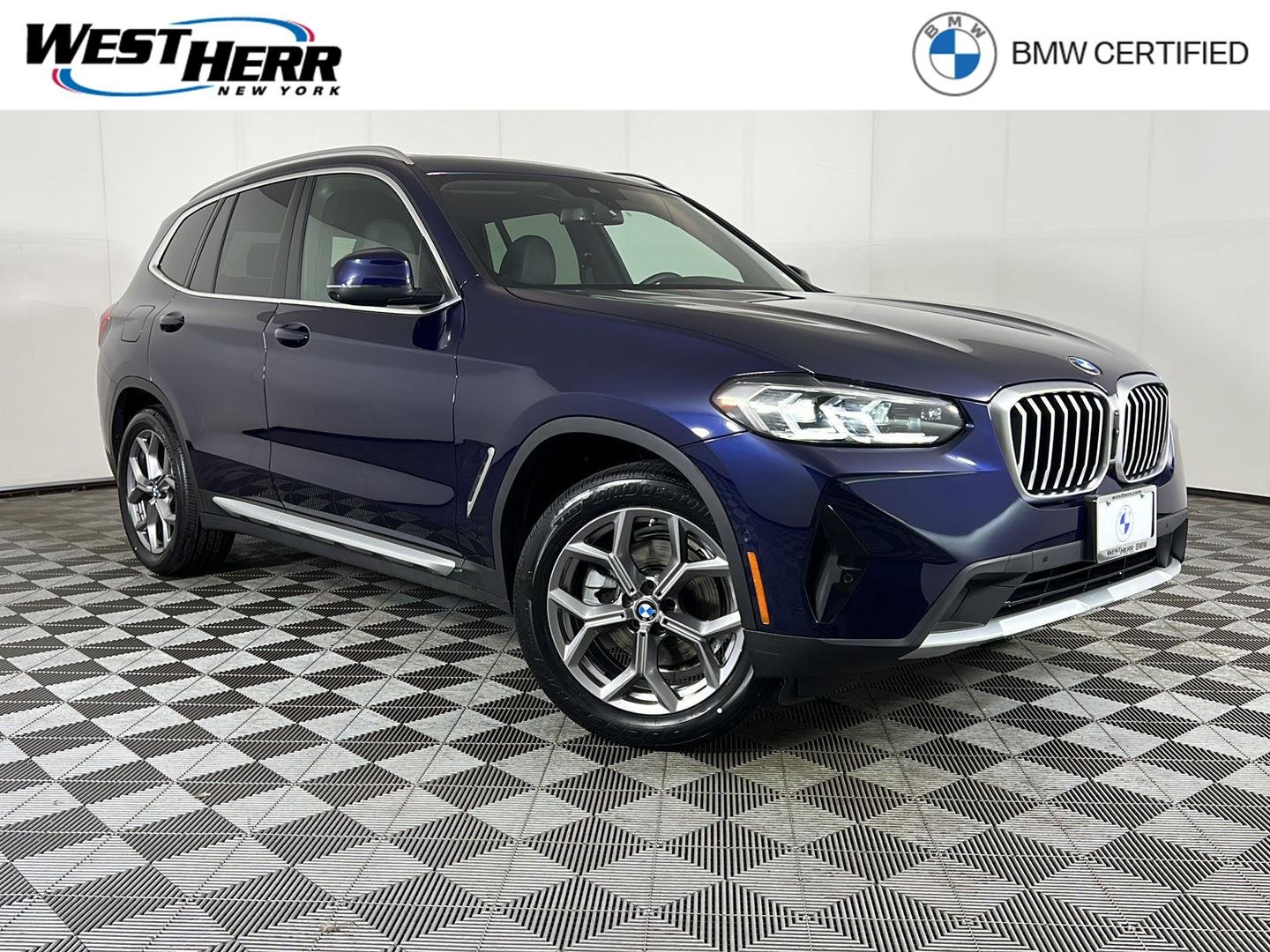 Certified Used 2024 Tanzanite Blue II Metallic BMW xDrive30i image 1