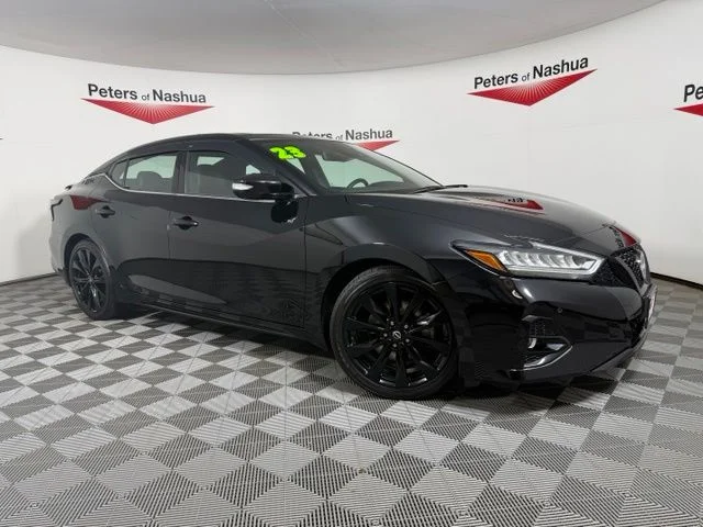 Certified Used 2023 Black Nissan SR image 1