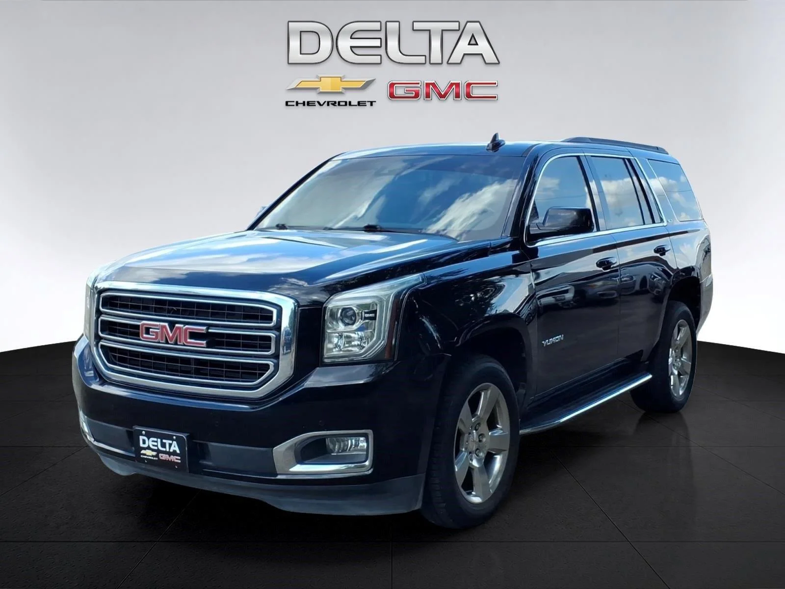 Used 2019 ONYX BLACK GMC SLT image 1