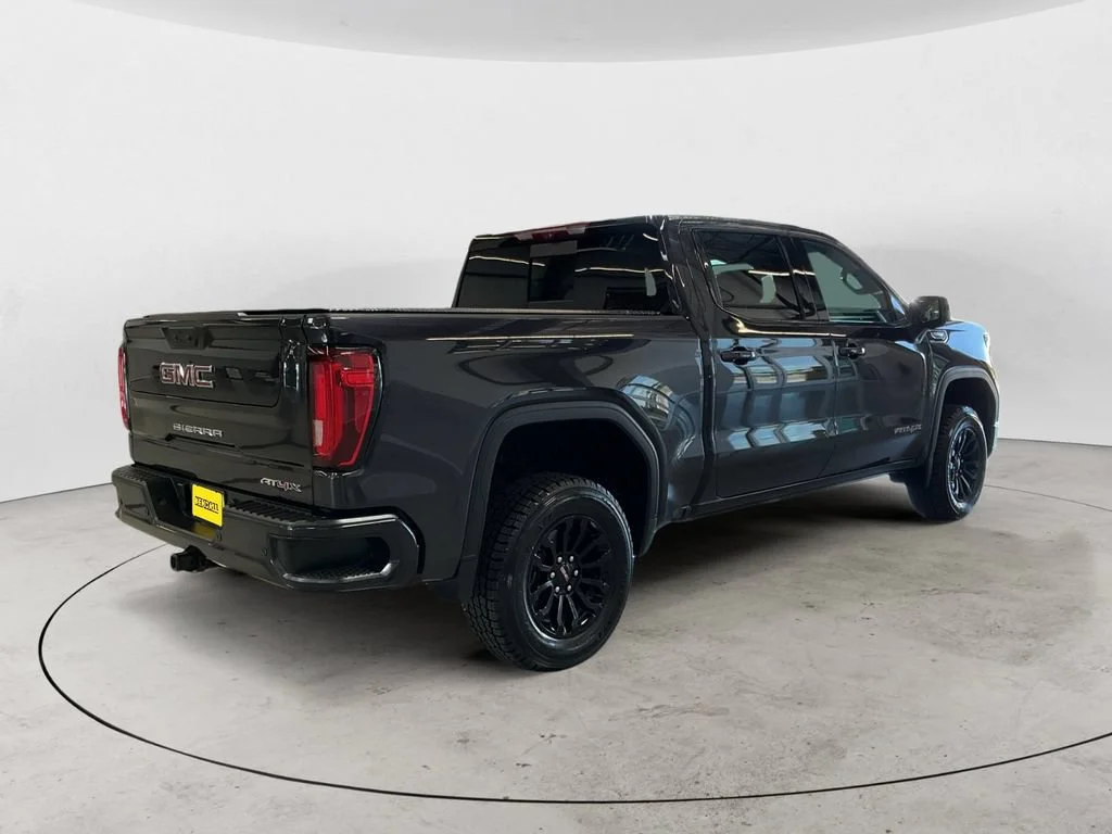 Used 2023 Titanium Rush Metallic GMC AT4X image 5