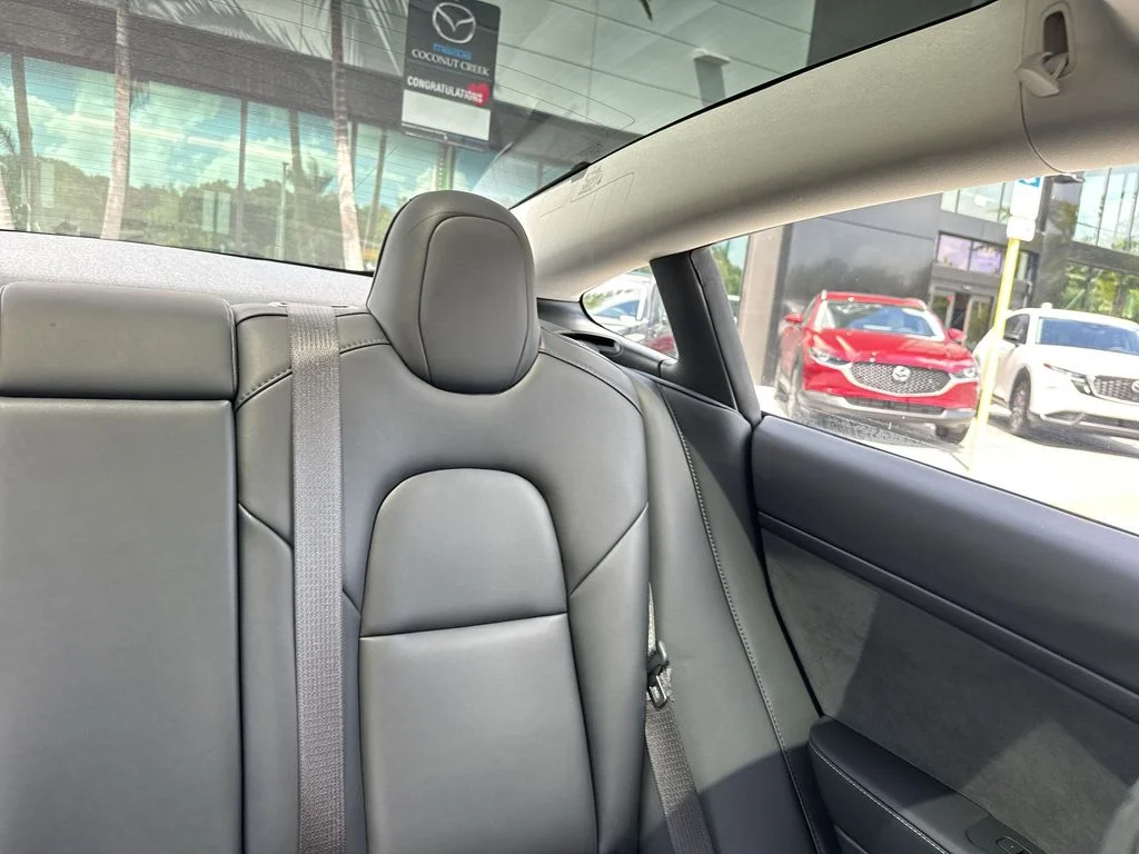 Used 2023 Solid Black Tesla  image 19