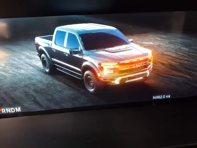 Used 2025 Blue Metallic Ford Raptor image 7